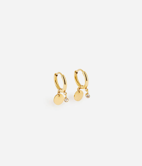 Boucles d'oreilles Béa Zag créole acier doré avec pampille médaille et cristal au lobe.