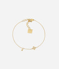 Bracelet Amaé Zag en acier doré à l'or fin, pendentif trèfle serti de petits zirconiums