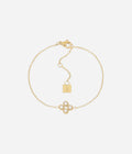 Bracelet Candela Zag, fleur de quatre zirconiums sur chaîne fine en acier doré