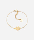 Bracelet Trébol Zag en acier doré à l'or fin, trèfle ciselé serti d'un cristal blanc