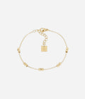 Bracelet Valda Zag composé de petits carrés en acier doré à l'or fin