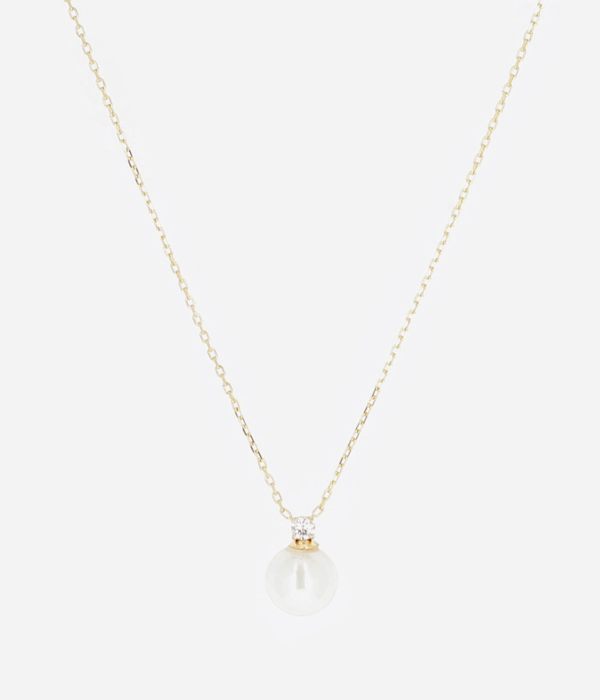 Collier Djima Zag, perle de culture et zirconium sur chaîne fine en acier doré à l'or fin