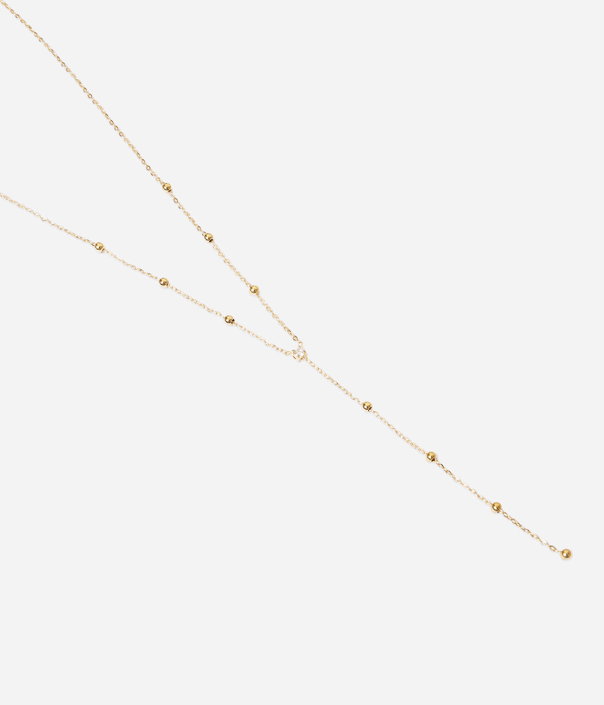 Collier Soho Zag en acier doré à l'or fin, zirconium blanc au centre et petits motifs d'acier sur la chaîne