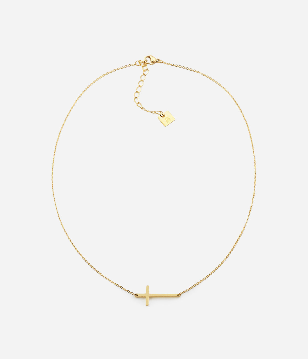Collier Spirit Zag, croix horizontale sur chaîne fine en acier doré
