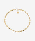 Collier Nyra ZAG – Chaîne grains de riz acier doré or fin, vue face au décolleté. Les Tendances de Charlotte, Saint-Quentin.